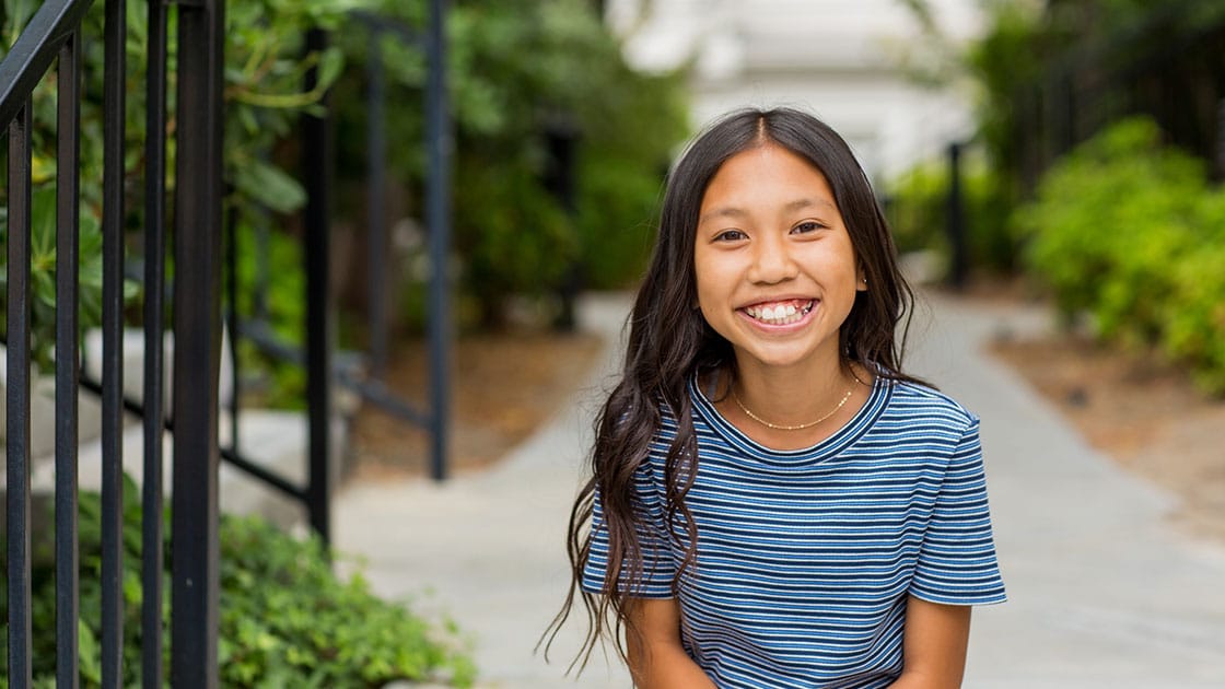 Girl smiling outside